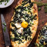 Khachapuri (Georgian Cheese Bread) with Kale and Herb Sauce